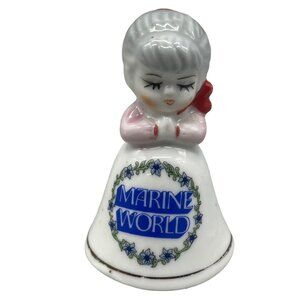 Vintage ceramic bell Marine World lady gray hair black eye lashes READ